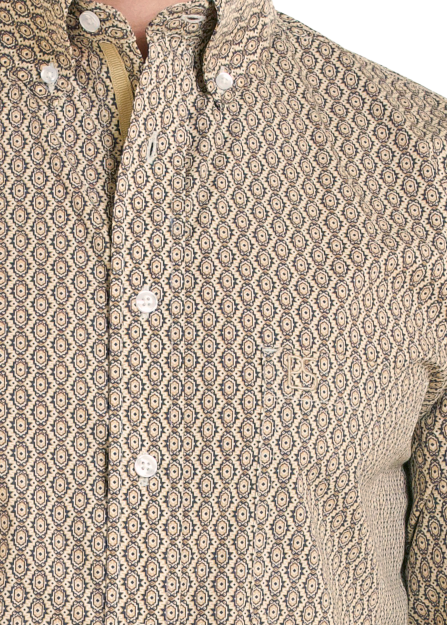 Close up of a button-down shirt with a geometric print and a single chest pocket.