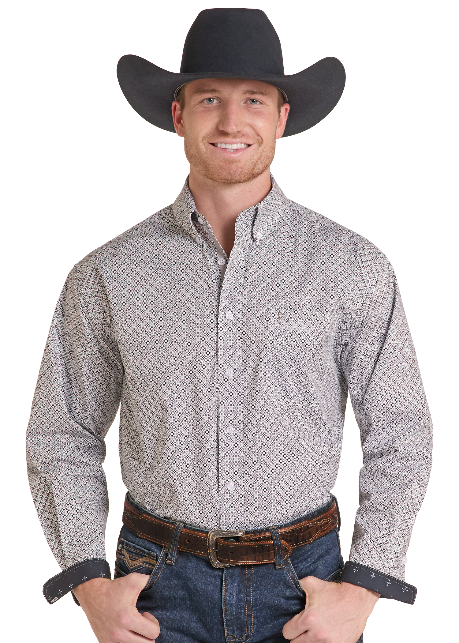A man wearing a black cowboy hat, a light gray and white patterned western button-down shirt, a brown leather belt, and blue jeans.