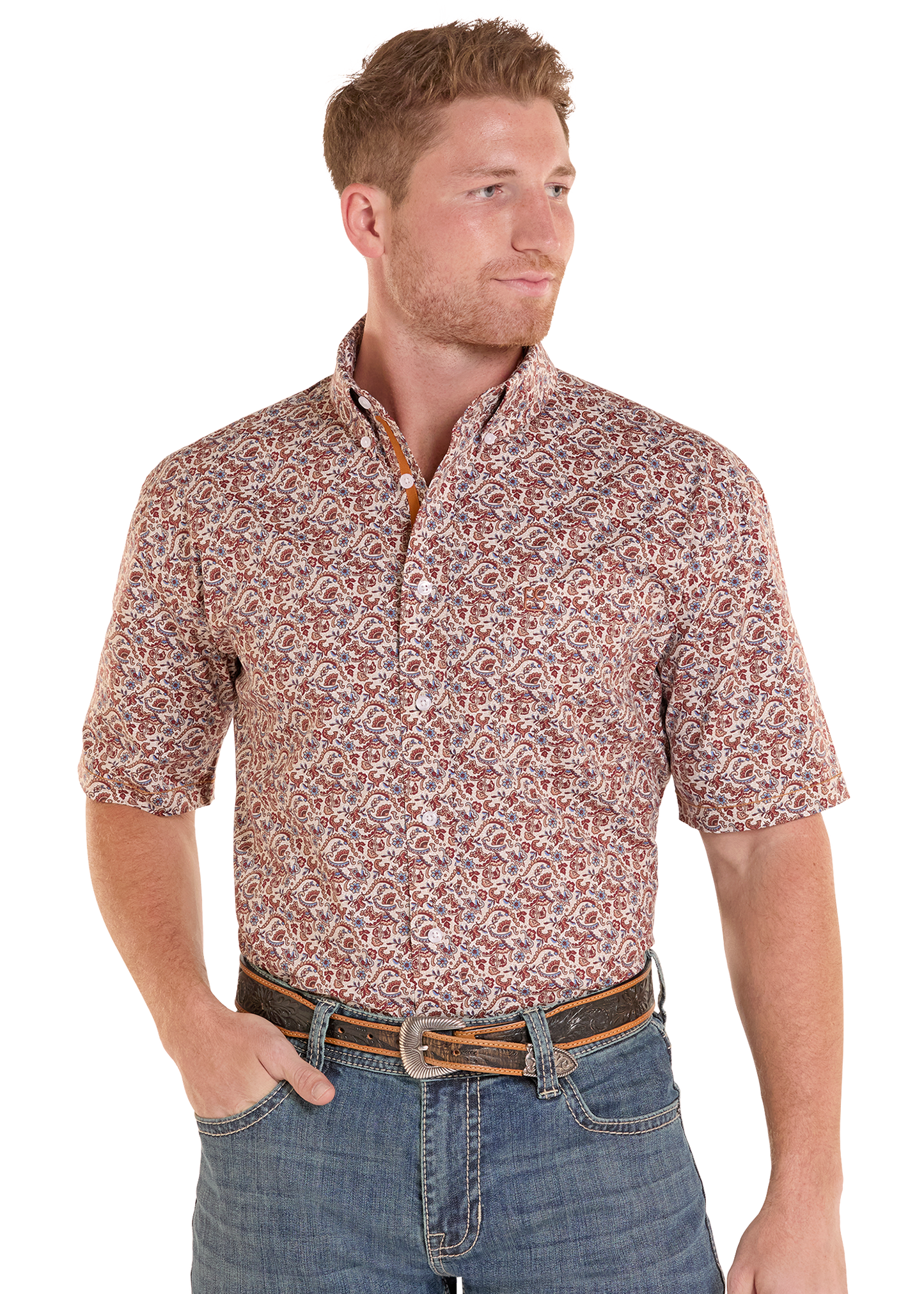 Man wearing a patterned short-sleeve shirt and jeans on a white background
