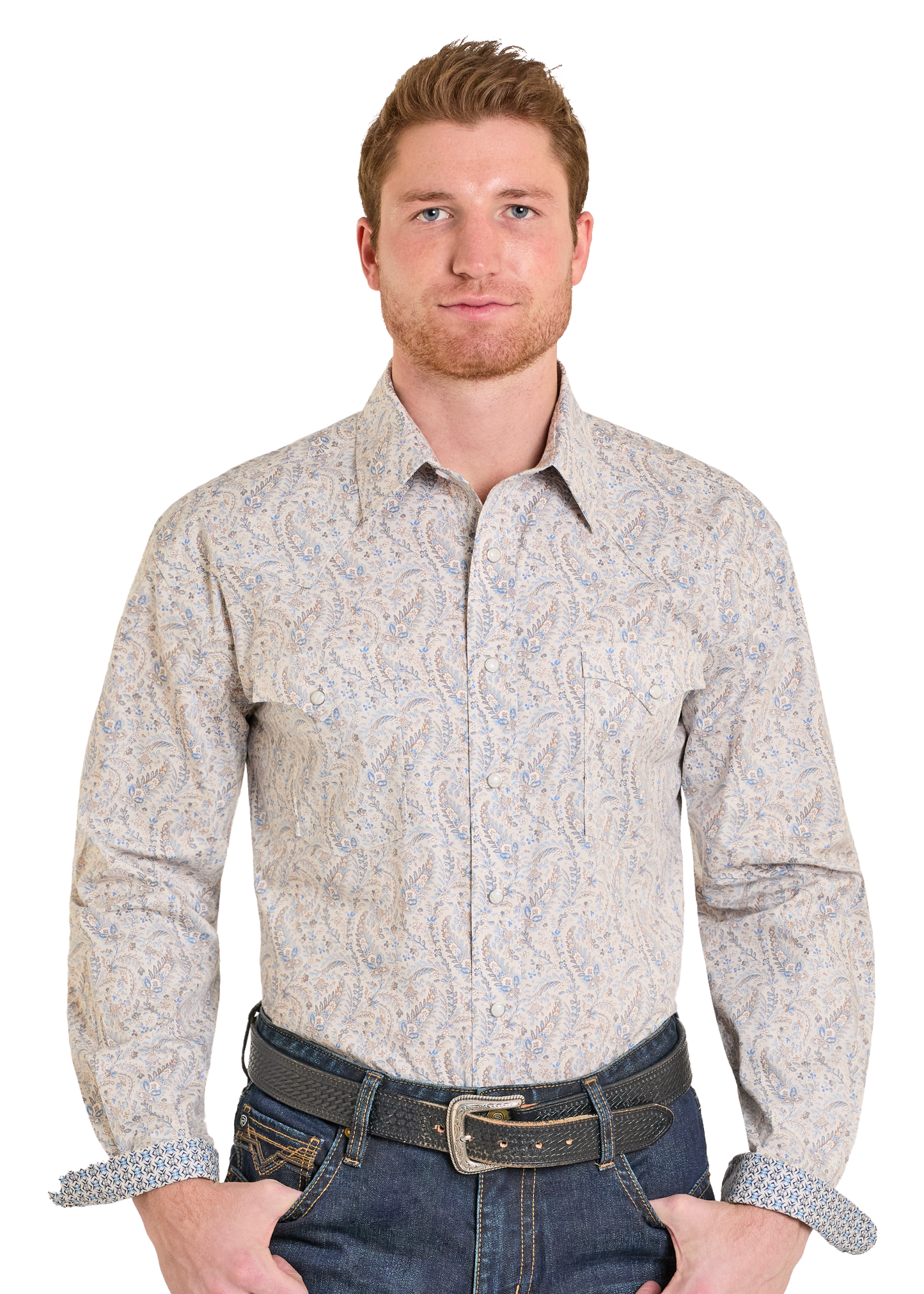Man wearing a patterned long-sleeve shirt and jeans on a white background