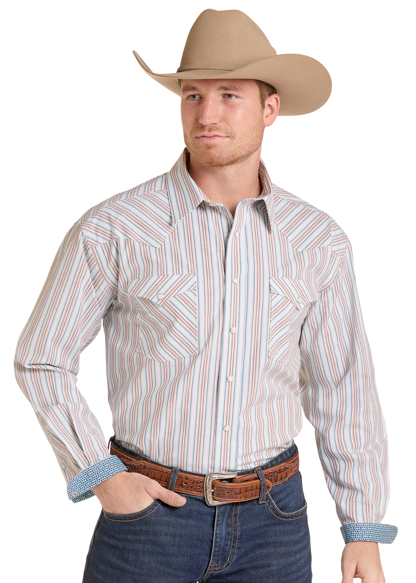 A man wearing a tan cowboy hat, a long-sleeve western-style snap-up shirt with vertical stripes in beige, blue, and orange, blue jeans.