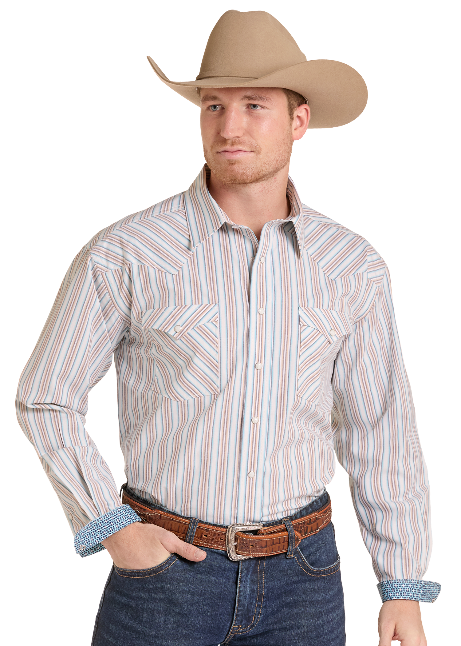 A man wearing a tan cowboy hat, a long-sleeve western-style snap-up shirt with vertical stripes in beige, blue, and orange, blue jeans.