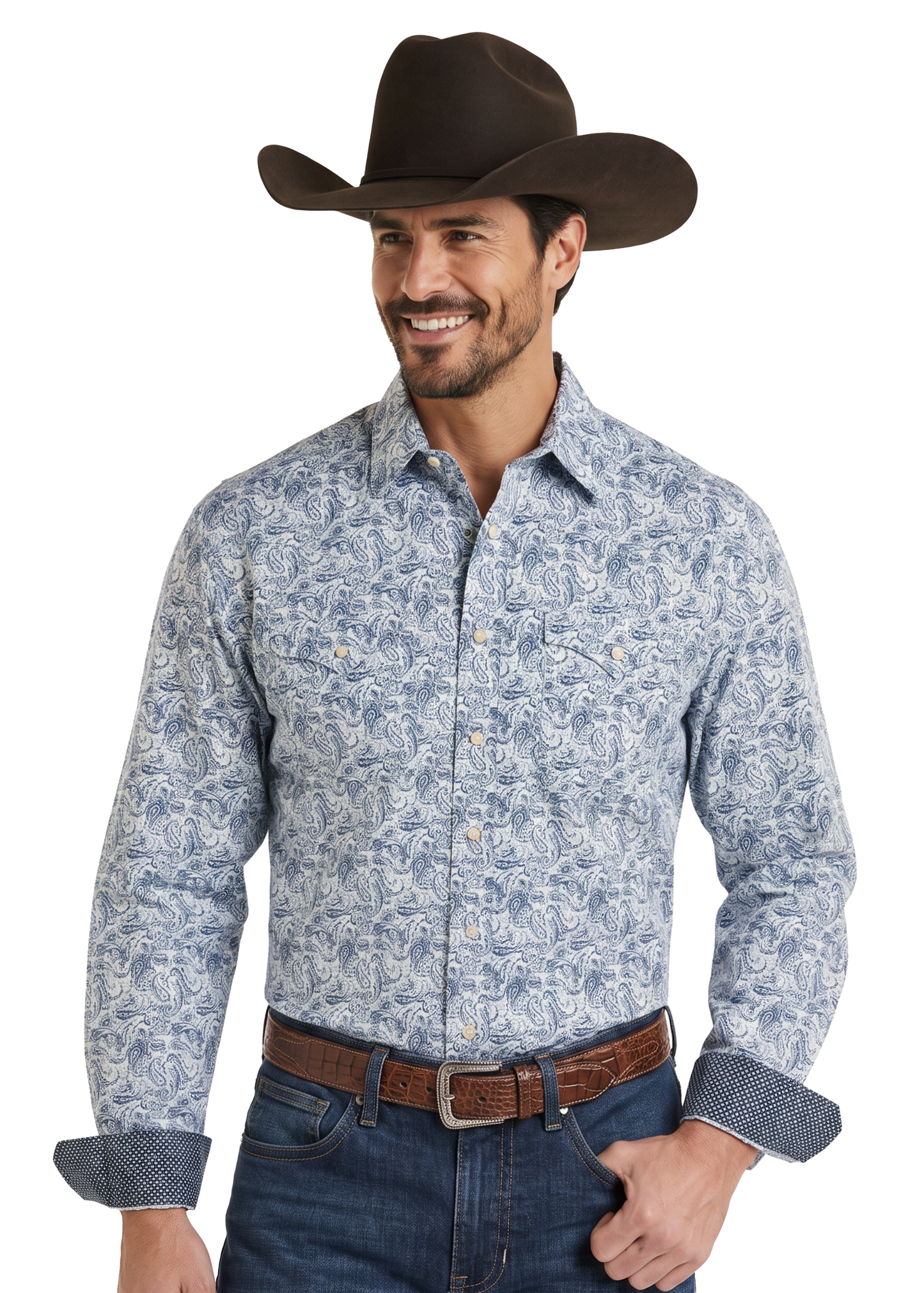 A man wearing a light blue and white paisley western long-sleeve button-down shirt, a brown cowboy hat, and a brown leather belt.
