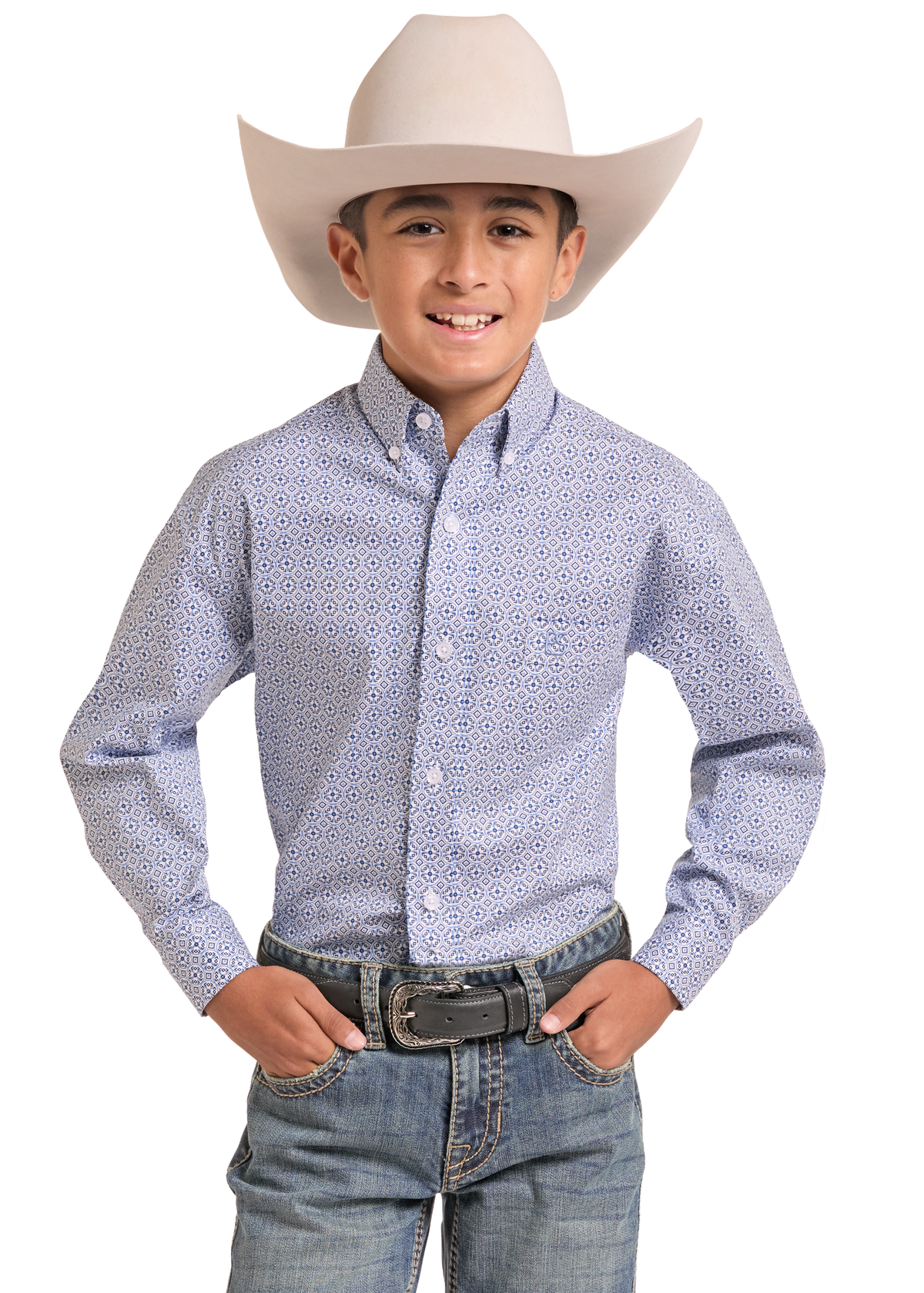 A young boy wearing a light blue and white patterned long-sleeve western shirt, blue jeans, and a beige cowboy hat, standing against a plain white background.