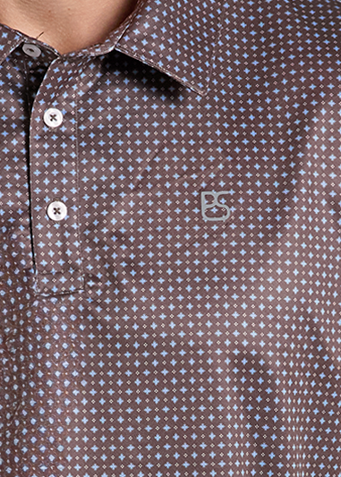 Brown short-sleeve polo shirt with a small white geometric pattern lose up. 