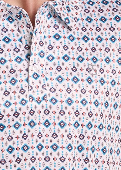 A closeup of a short-sleeve polo shirt with a blue, red, and white geometric pattern.
