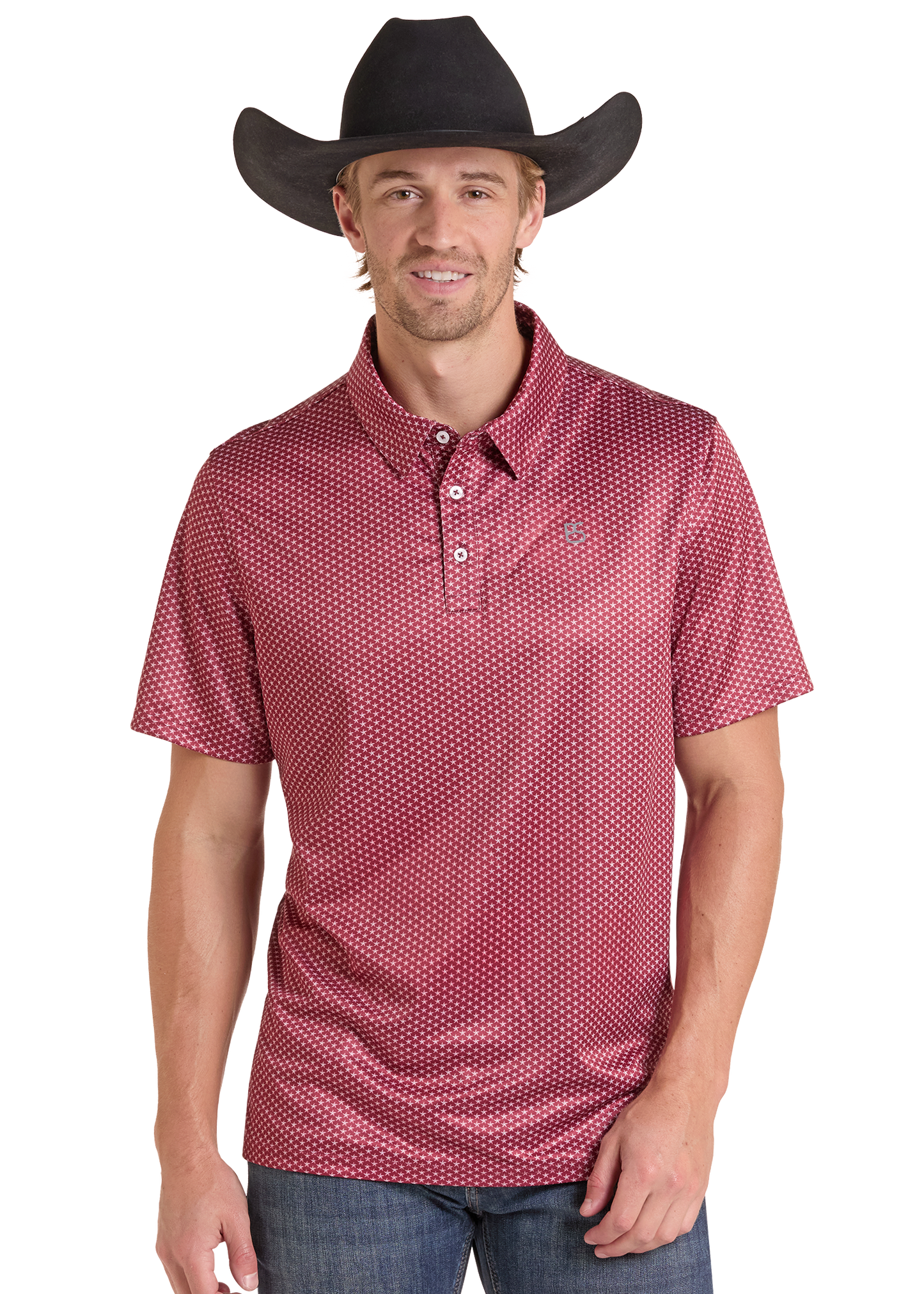 A man wearing a black cowboy hat and a red short-sleeve polo shirt with a white micro-dot pattern, paired with blue jeans, photographed against a solid white background.