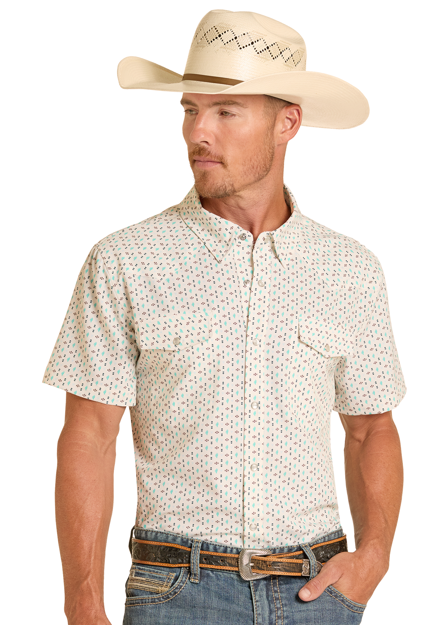 Man wearing a patterned short-sleeve shirt, jeans, and a cowboy hat on a white background