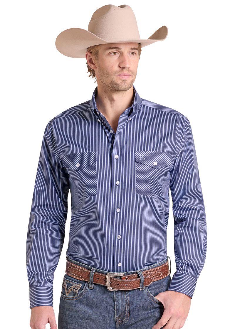 A man wearing a blue and white vertically striped western long-sleeve button-down shirt.