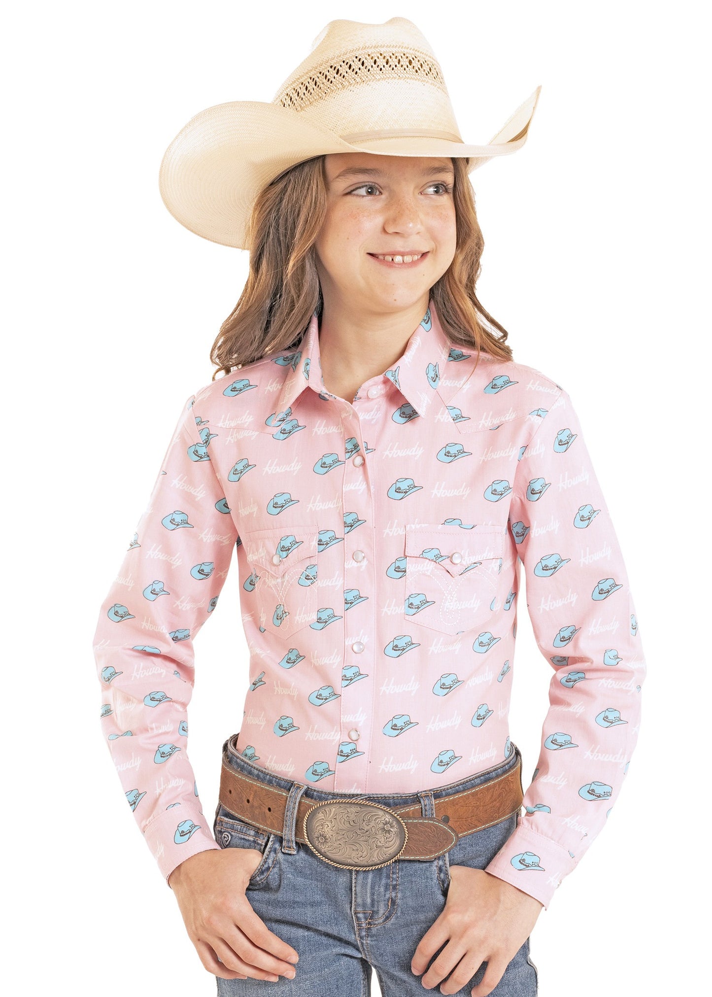 Child wearing a pink long-sleeve shirt with a pattern, blue jeans, and a cowboy hat on a white background