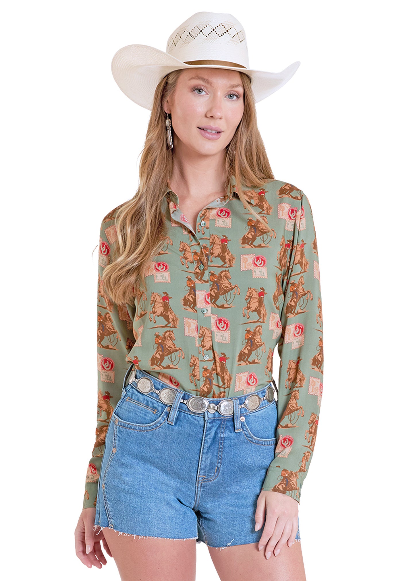 Woman wearing a patterned shirt and denim shorts with a white cowboy hat on a white background
