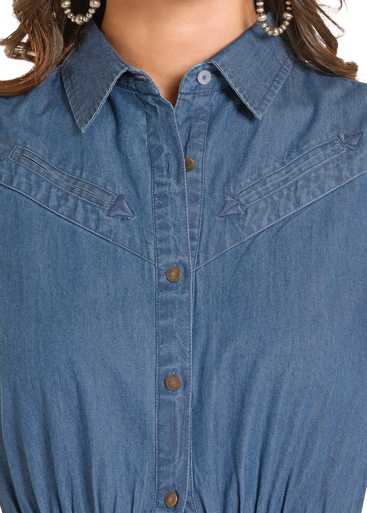 Close-up of a blue dress shirt with buttons