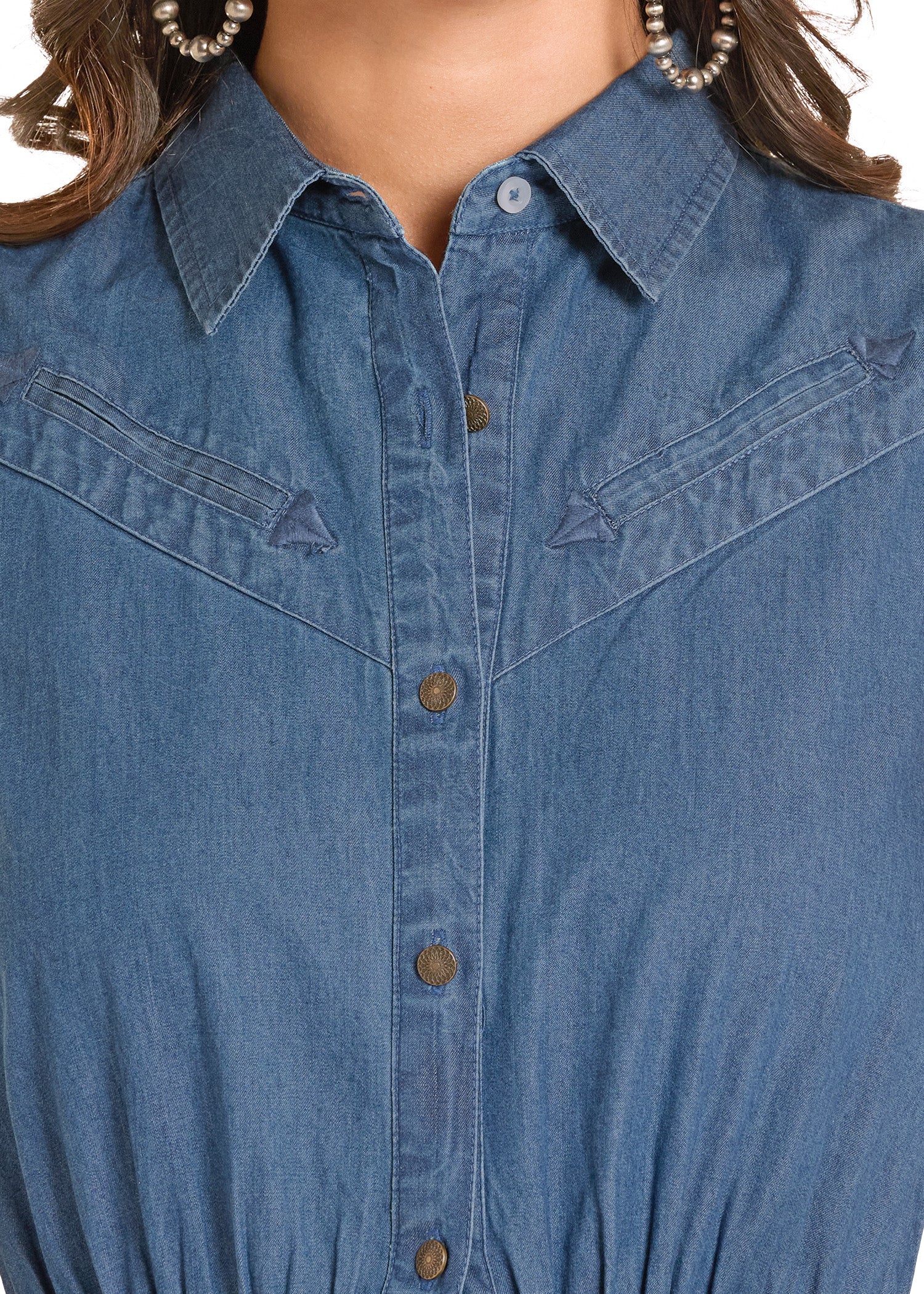 Close-up of a blue dress shirt with buttons
