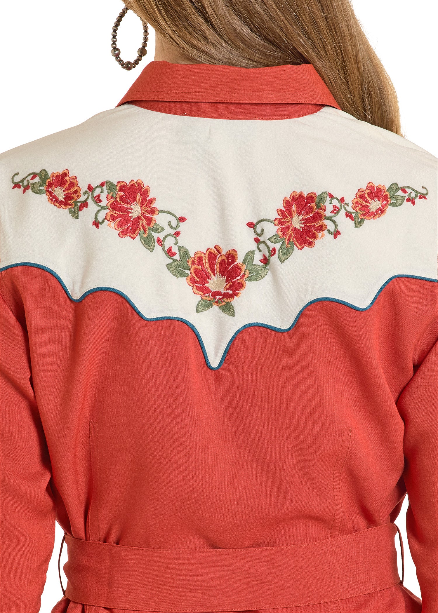 Red and white embroidered jacket with floral patterns on a white background