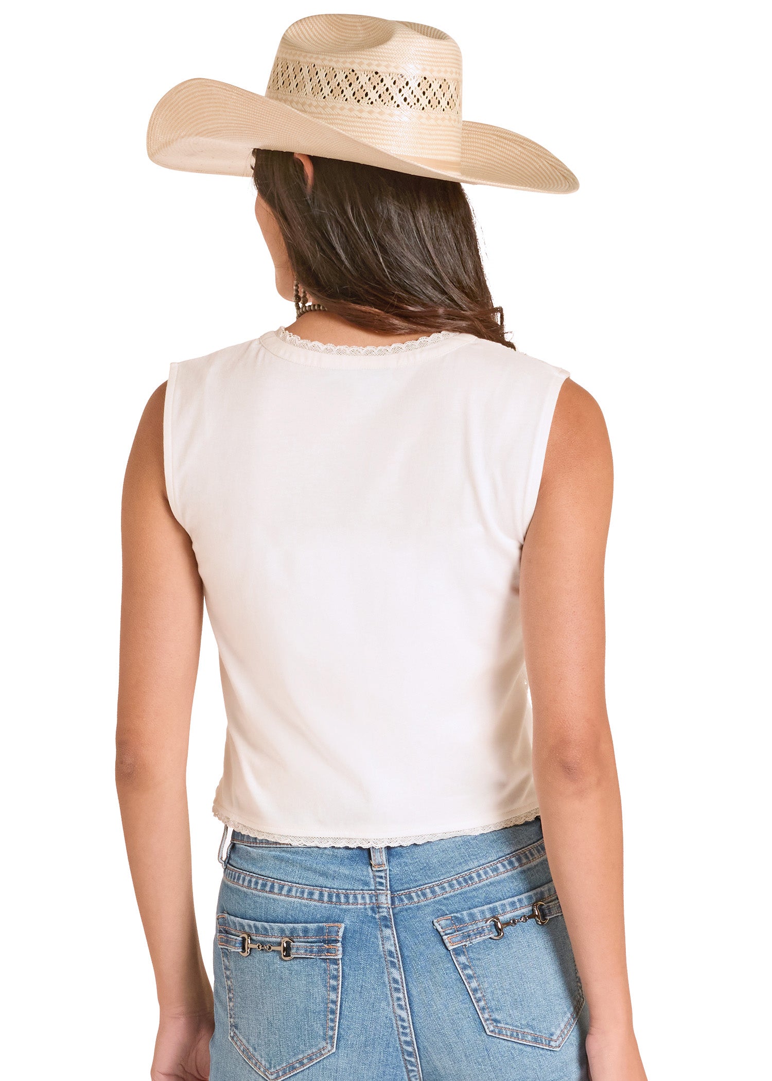 Person wearing a white sleeveless top and blue jeans with a beige cowboy hat on a white background