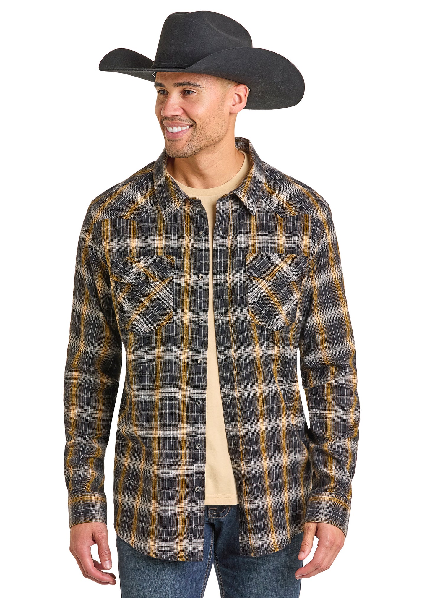 Man wearing a black cowboy hat and plaid shirt on a white background