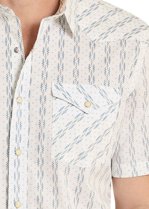Close up of a patterned white shirt on a white background
