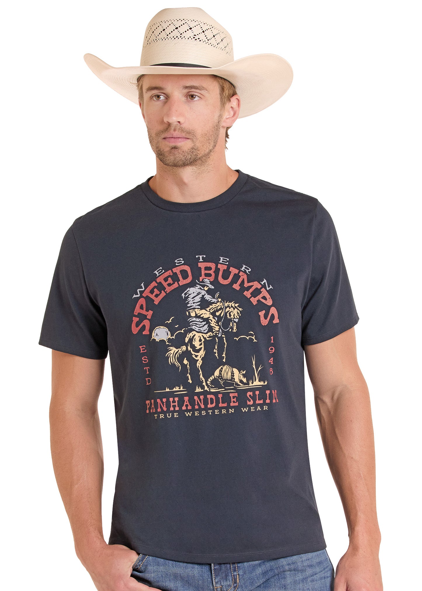 Man wearing a navy t-shirt with a graphic design and a cowboy hat on a white background