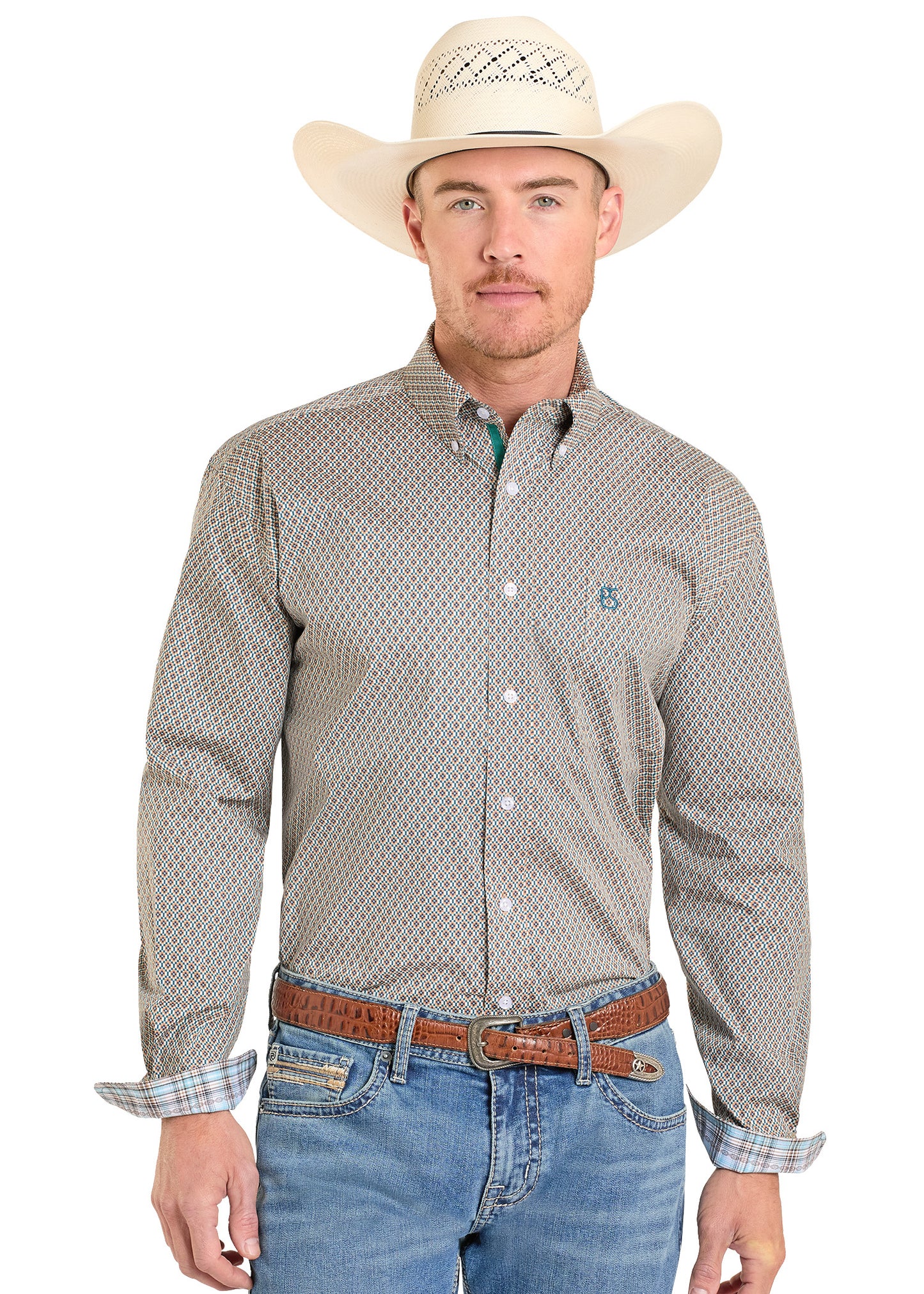 Man wearing a western button down shirt with a digital geometric pattern. 