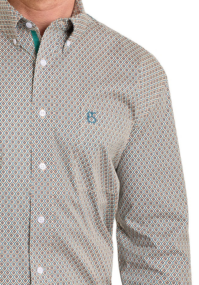 Man wearing a patterned button-up shirt, jeans, and a cowboy hat on a white background