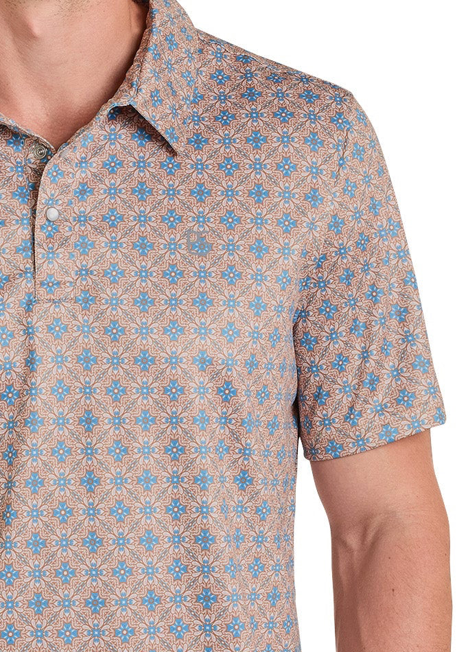 Man wearing a patterned polo shirt and cowboy hat on a white background