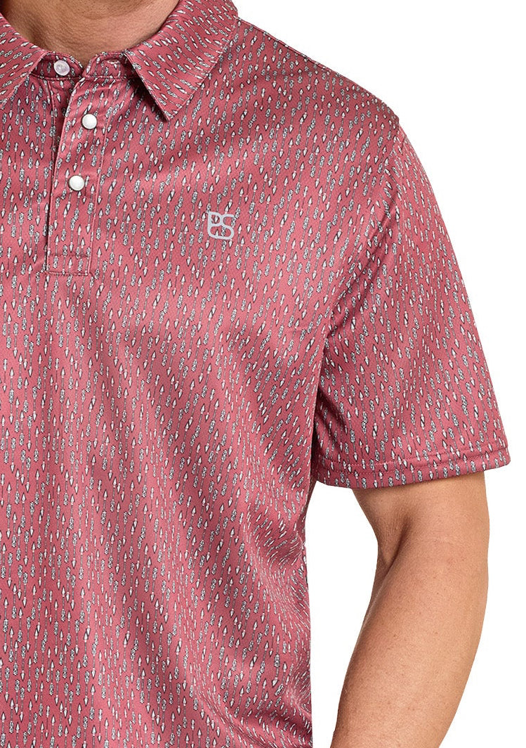 Man wearing a red patterned polo shirt and cowboy hat on a white background