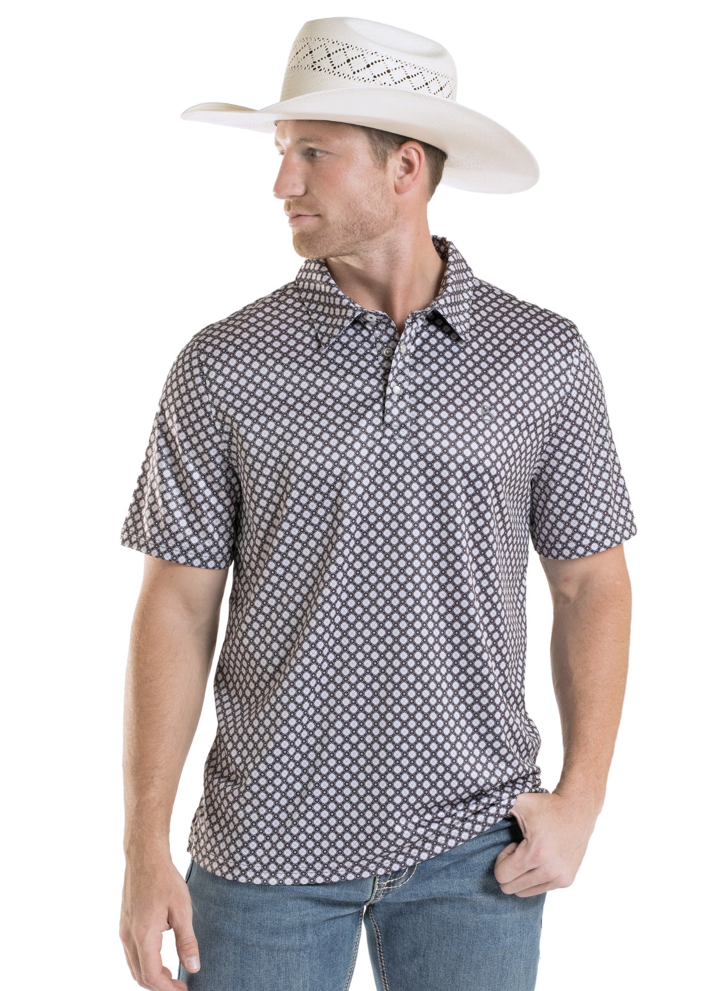 Man wearing a patterned short-sleeve shirt and white cowboy hat on a white background