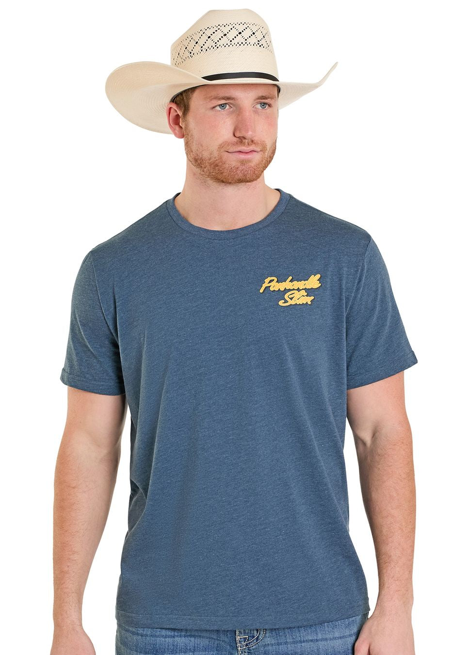 Man wearing a blue t-shirt with a logo and a straw hat on a white background